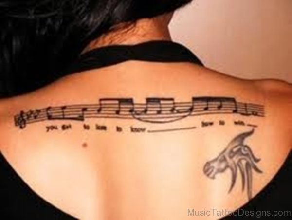 Pretty Music Tattoo On Back