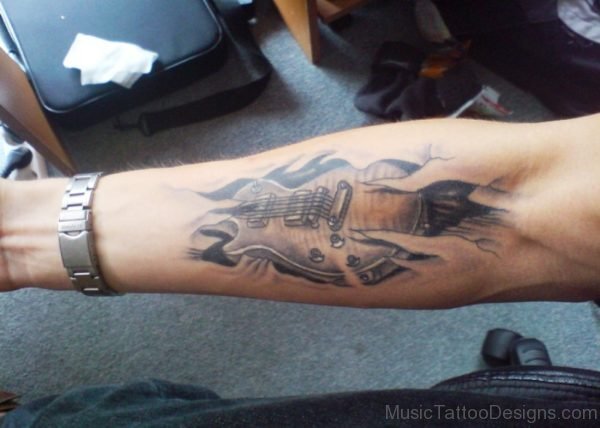 Ripped Guitar Tattoo On Forearm 