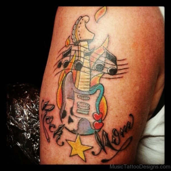 Rock Music Notes Guitar Tattoo On Shoulder