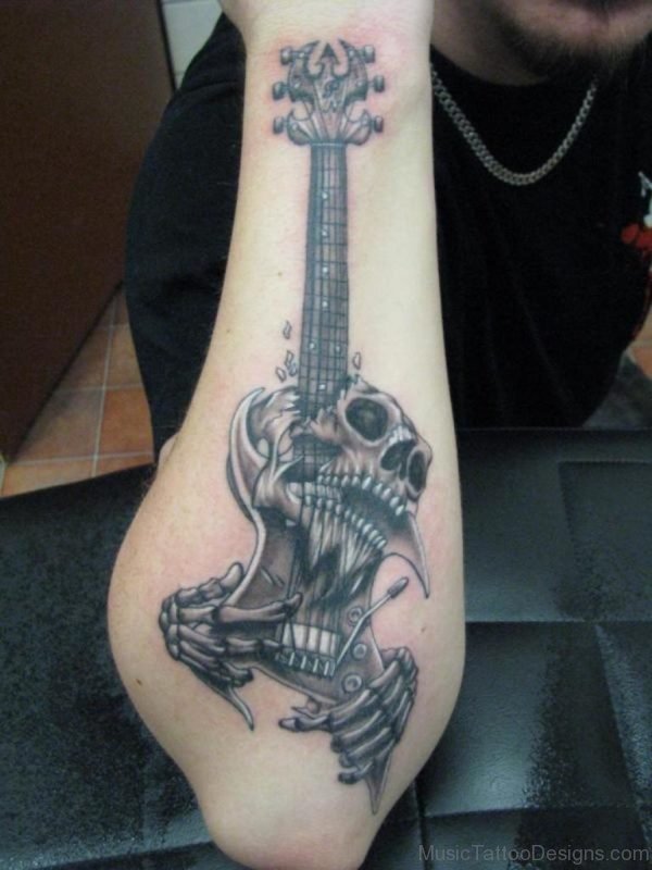 Skull Guitar Tattoo On Arm