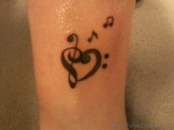 Small Music Note Tattoo On Wrist