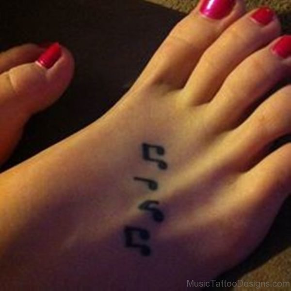 Small Music Tattoo On Foot
