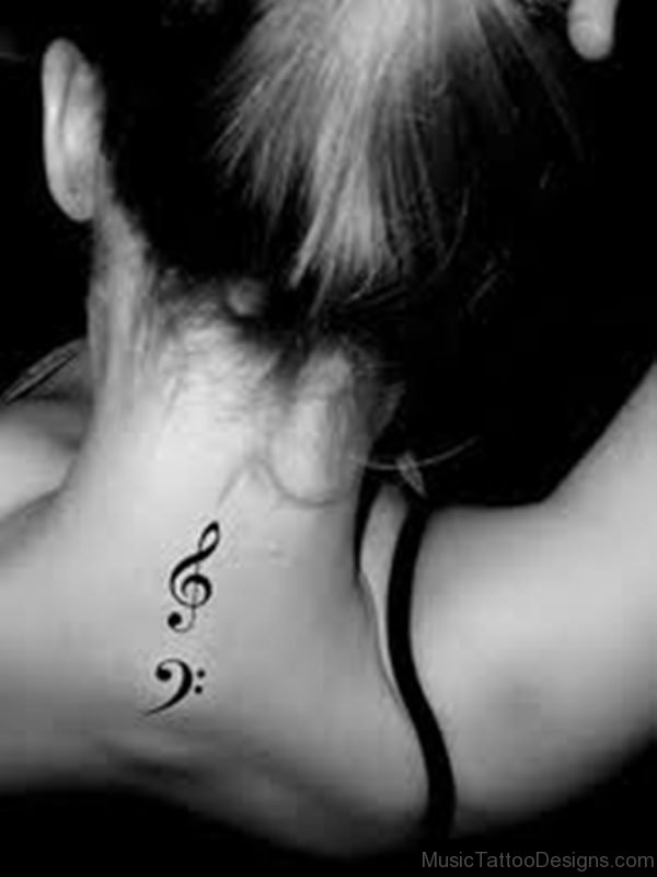 Small Music Word Tattoo On Back