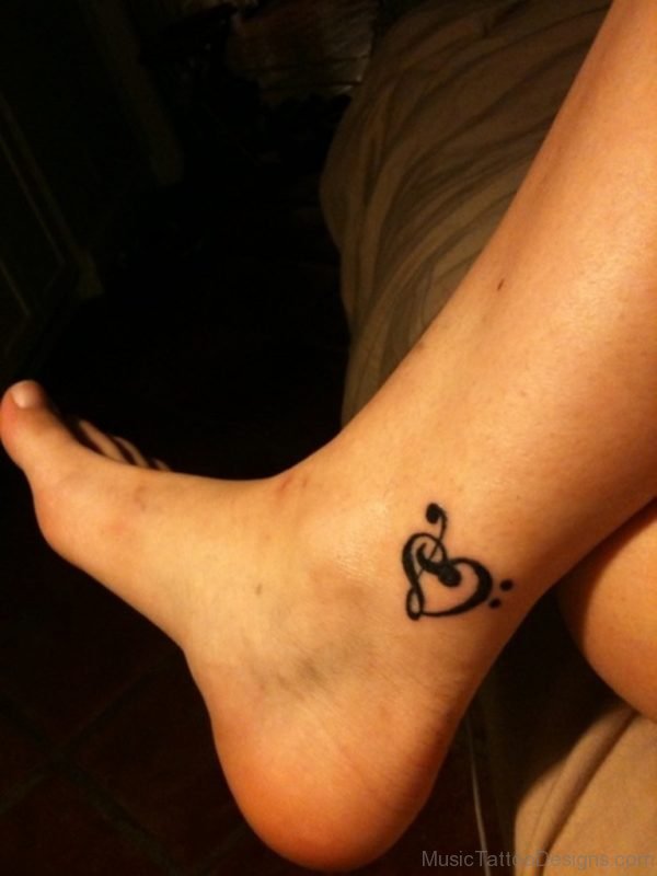 Small Pretty Music Notes Heart Tattoo On Foot