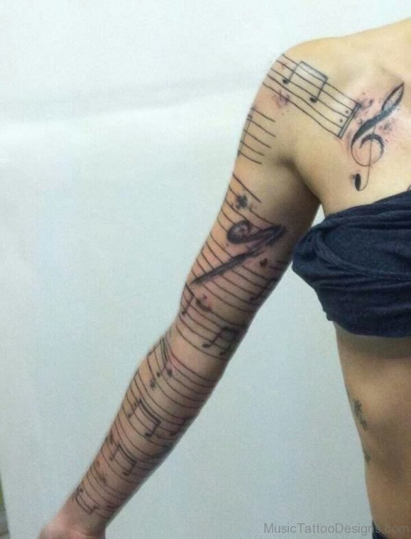 Stunning Music Tattoo On Full Arm