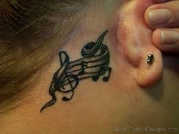 Stylish Music Tattoo On Behind Ear Image
