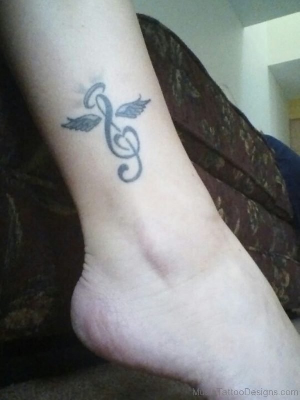 Winged Music Note Tattoo On Ankle