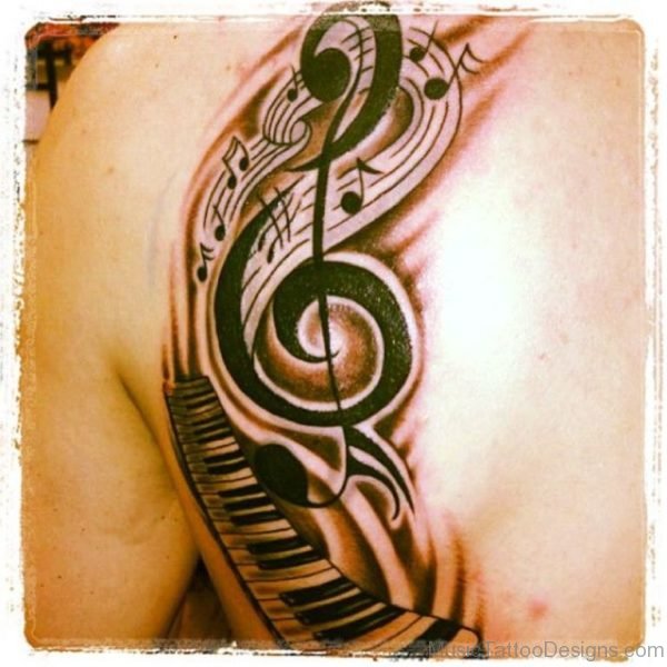 Wonderful Piano Keys And Music Notes Tattoo