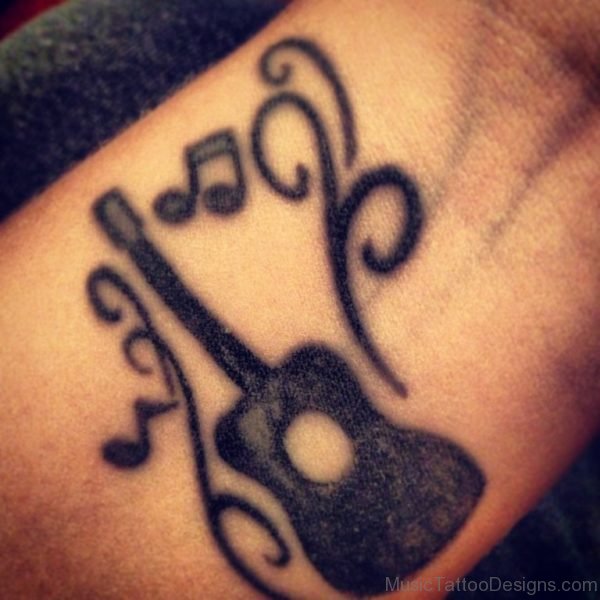 Black Music Notes Guitar Tattoo On Wrist