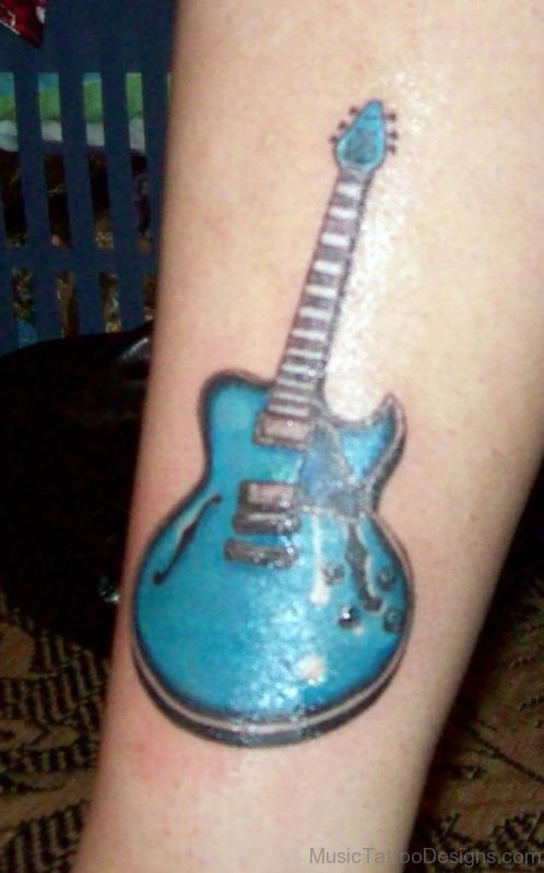 Blue Guitar Tattoo On Wrist