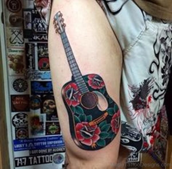 Colored Guitar Tattoo On Thigh