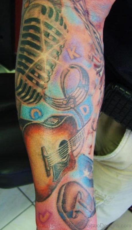 Colored Music Theme Tattoo On Arm