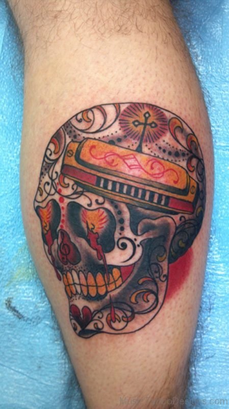 Colored Skull And Harmonica Tattoo