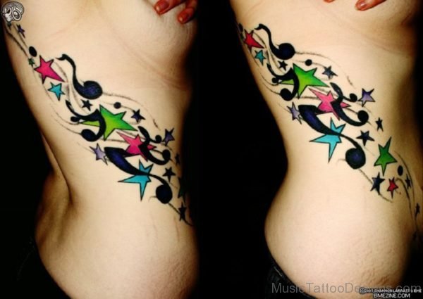 Colored Stars And Music Note Tattoo