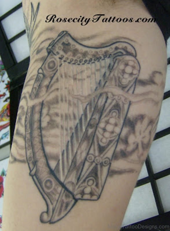 Cool Harp Tattoo Design