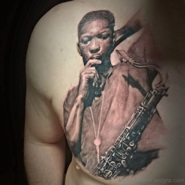 Cool Saxophone Tattoo On Chest