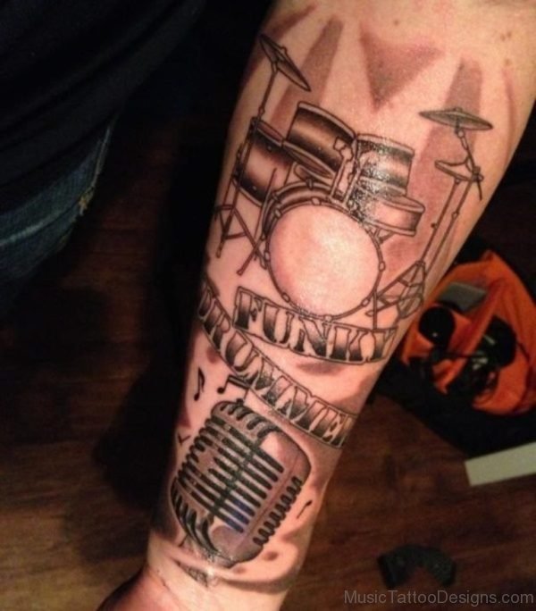 Drummer Tattoo On Arm