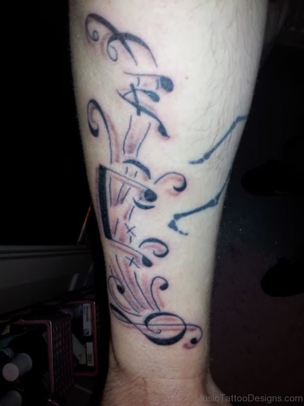 Elegant Music Notes Tattoo On Arm