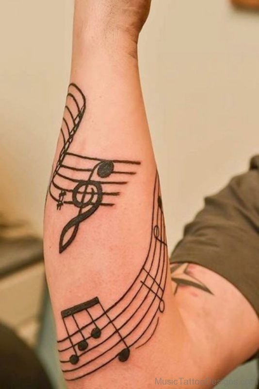 Excellent Music Tattoo On Arm