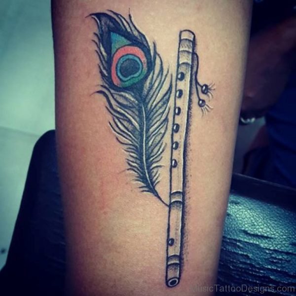 Fabulous Feather And Flute Tattoo