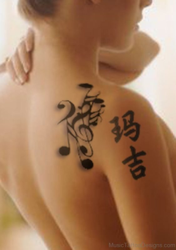Fancy Music Notes Tattoos On Shoulder