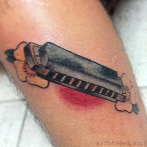 Graceful Harmonica Tattoo
