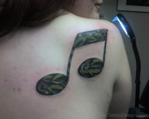 Green Leaves In Music Note Tattoo On Back Shoulder