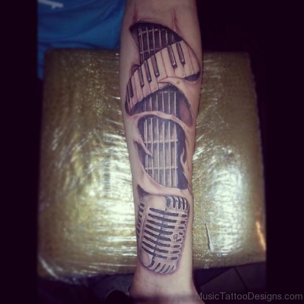 Grey Ink 3D Piano Keys And Microphone Tattoo On Forearm