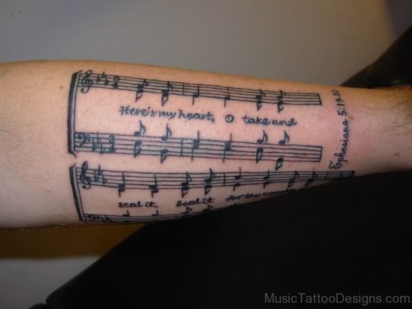 Grey Ink Music Tattoo On Arm