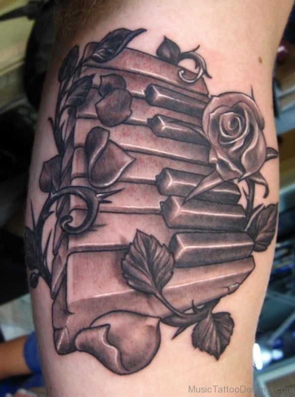 Grey Rose And Piano Keys Tattoo