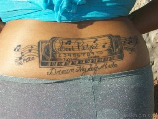 Harmonica Tattoo On Lower back