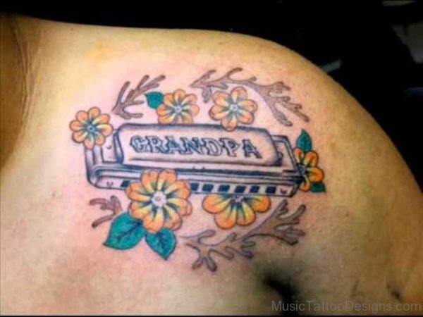 Harmonica Tattoo On Shoulder