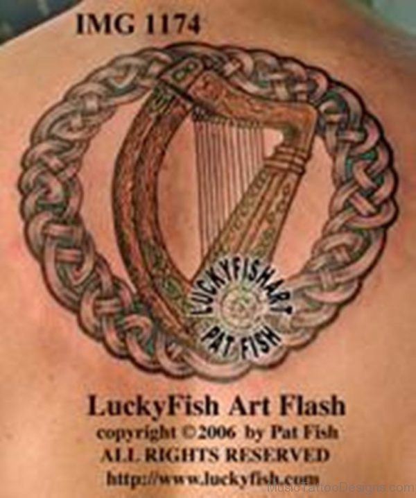 Harp Tattoo On Back Image