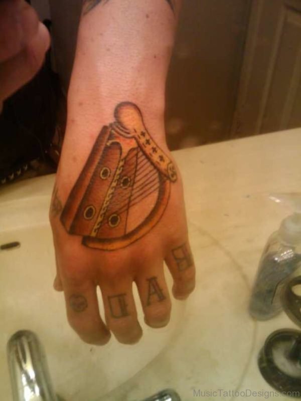 Harp Tattoo On Hand