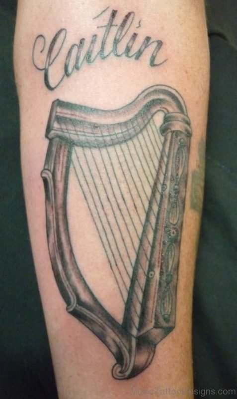 Harp Tattoo On arm