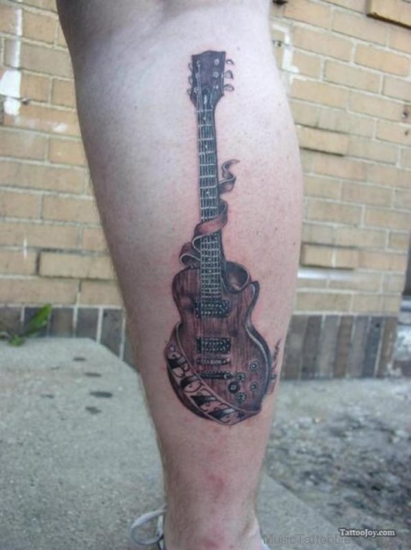Nice Guitar Tattoo On Leg