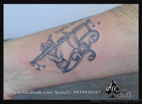Nice Looking Flute Tattoo