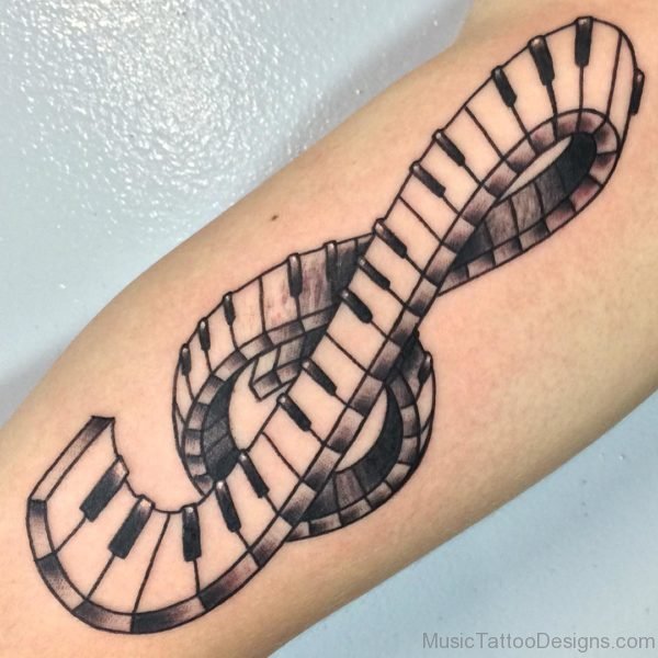 Nice Music Symbol Shaped Piano Keys Tattoo On Bicep