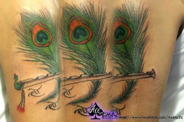 Peacock Feather With Flute Tattoo Image 4