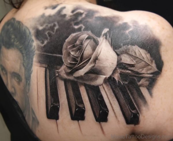 Realistic Rose On Piano Keys Tattoo On Upper Back