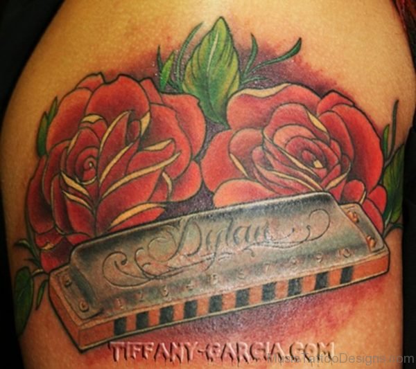 Red Rose and Harmonica Tattoo