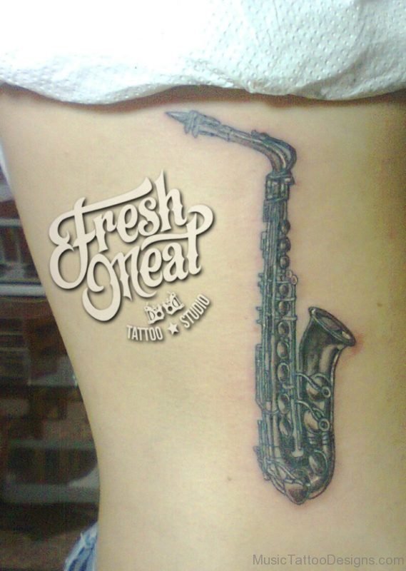 Saxophone Tattoo Design On Rib