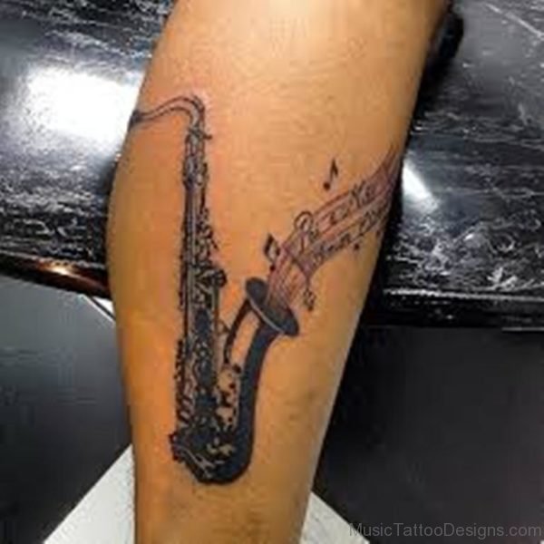 Saxophone Tattoo On Arm Image