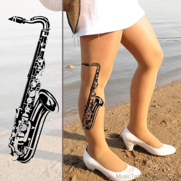 Saxophone Tattoo On Leg