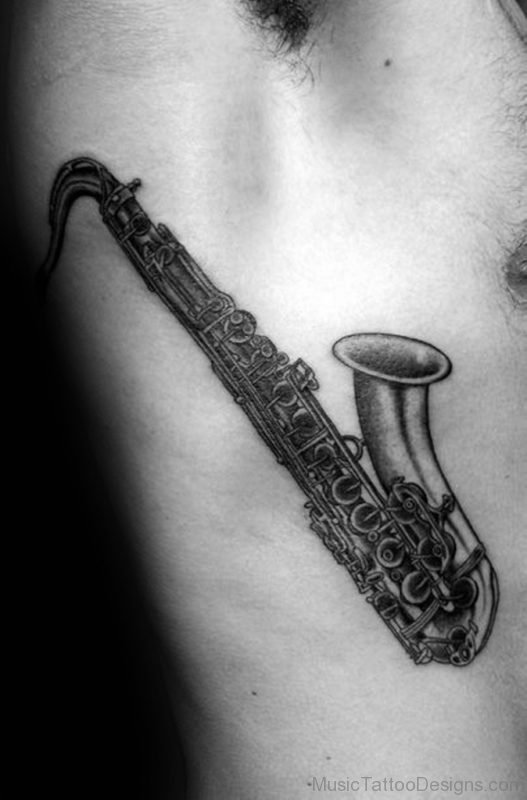 Saxophone Tattoo On Rib