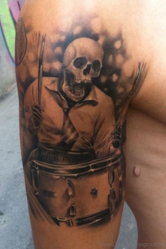 Skeleton playing the drums tattoo
