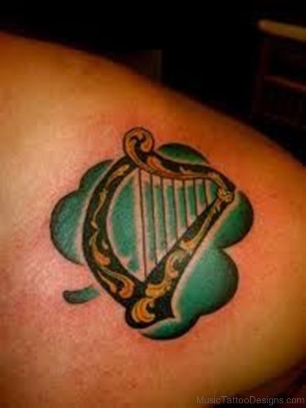 Small Harp Tattoo On Back