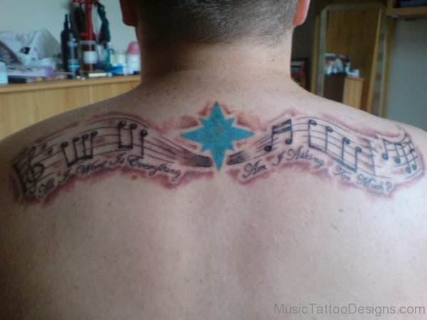 Star And Music Notes Tattoo