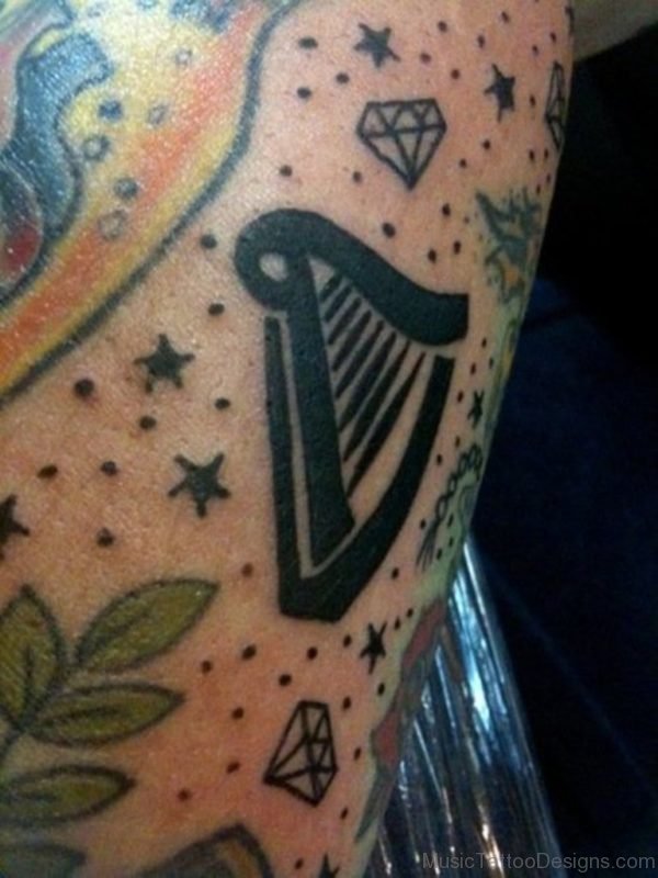 Stunning Harp Tattoo