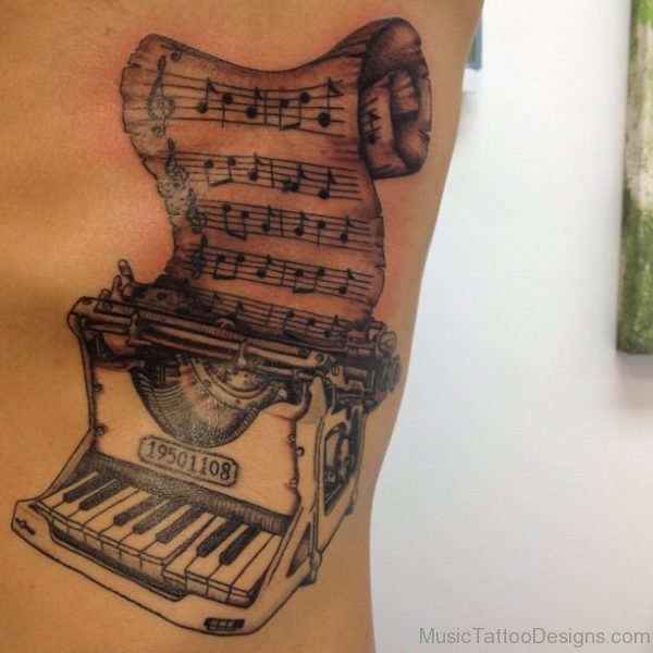 Stunning Piano Tattoo On Rib 